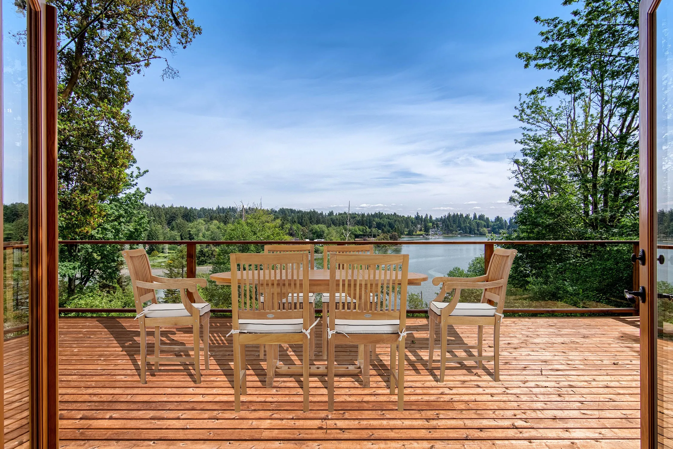 7 Piece Teak Wood Castle Patio Dining Set with Round to Oval Extension Table, 4 Side Chairs and 2 Arm Chairs