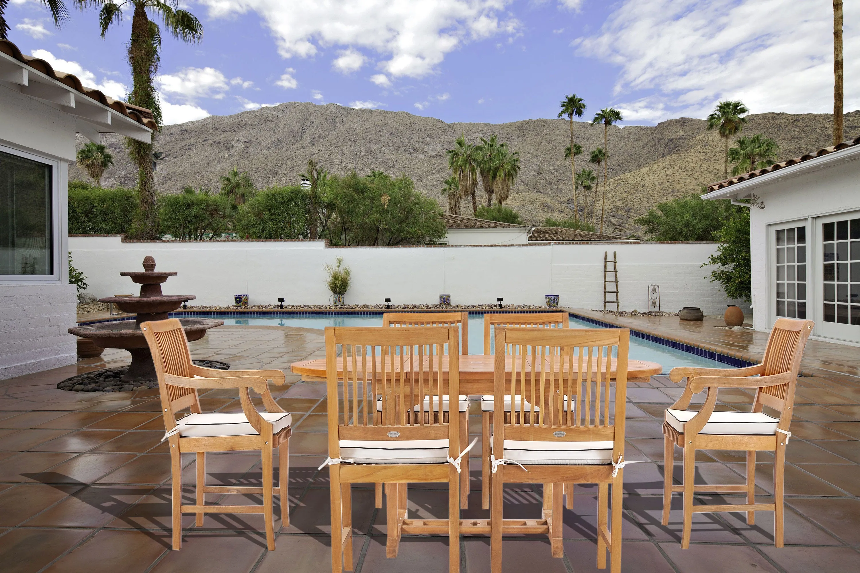 7 Piece Teak Wood Castle Patio Dining Set with Round to Oval Extension Table, 4 Side Chairs and 2 Arm Chairs