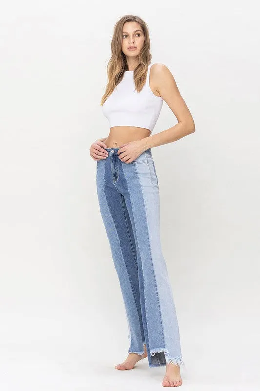 TEEK - Charmingly High Rise Relaxed Flare Uneven Raw Hem Jeans